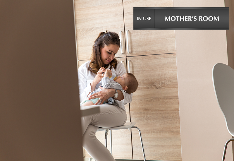 Mother Feeding Baby in Mothers Room